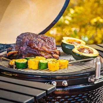 ribs and vegetables cooking on commercial pellet smoker grill